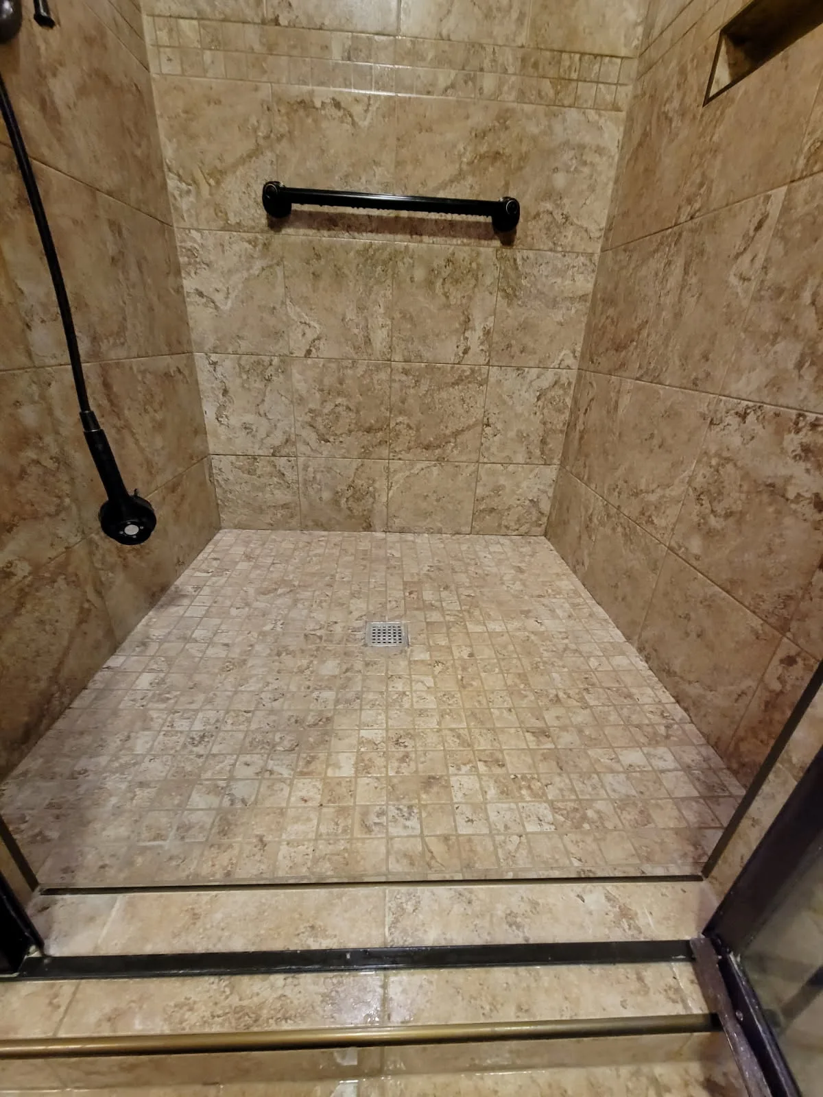 shower tile & grout after cleaning by Butler Total Cleaning